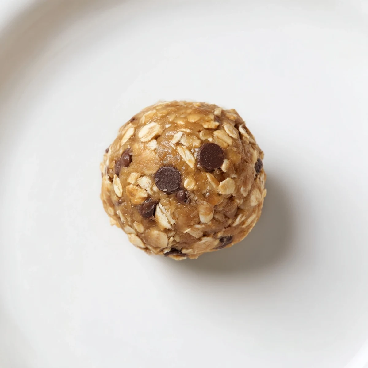 A close-up view of fresh No-Bake Peanut Butter Energy Balls, ideal for a quick, healthy snack on the go.