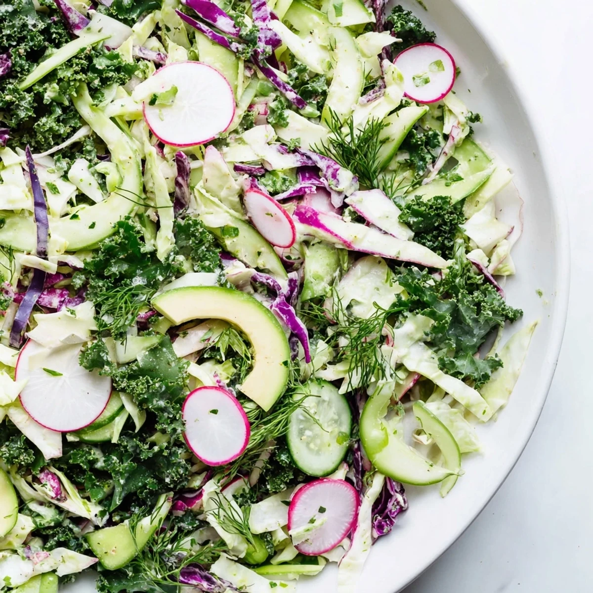 Close-up of a refreshing Green Goddess Detox Cabbage Salad, brimming with healthy, crunchy ingredients.