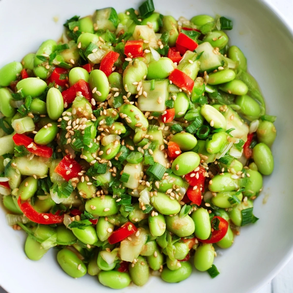 Vibrant Edamame Salad with crisp cucumber, a sesame dressing, ready to enjoy as a side dish.
