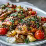 Vibrant sheet pan chicken dinner with zucchini and cherry tomatoes, roasted to perfection for a healthy, flavorful meal.