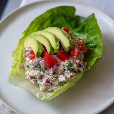 Close-up of vibrant Quick & Healthy Tuna Salad Lettuce Wraps, featuring tender tuna and crisp lettuce.
