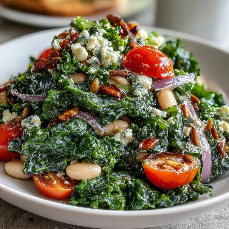 A wholesome white bean and kale salad perfectly seasoned with garlic.