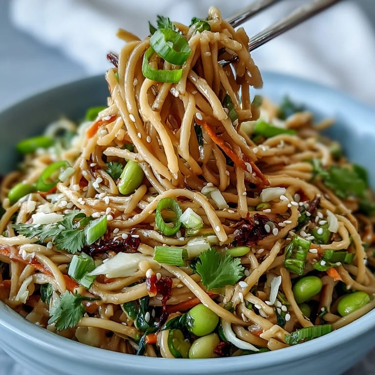 A refreshing Sesame Ginger Noodle Bowl, perfectly chilled, ready to serve.
